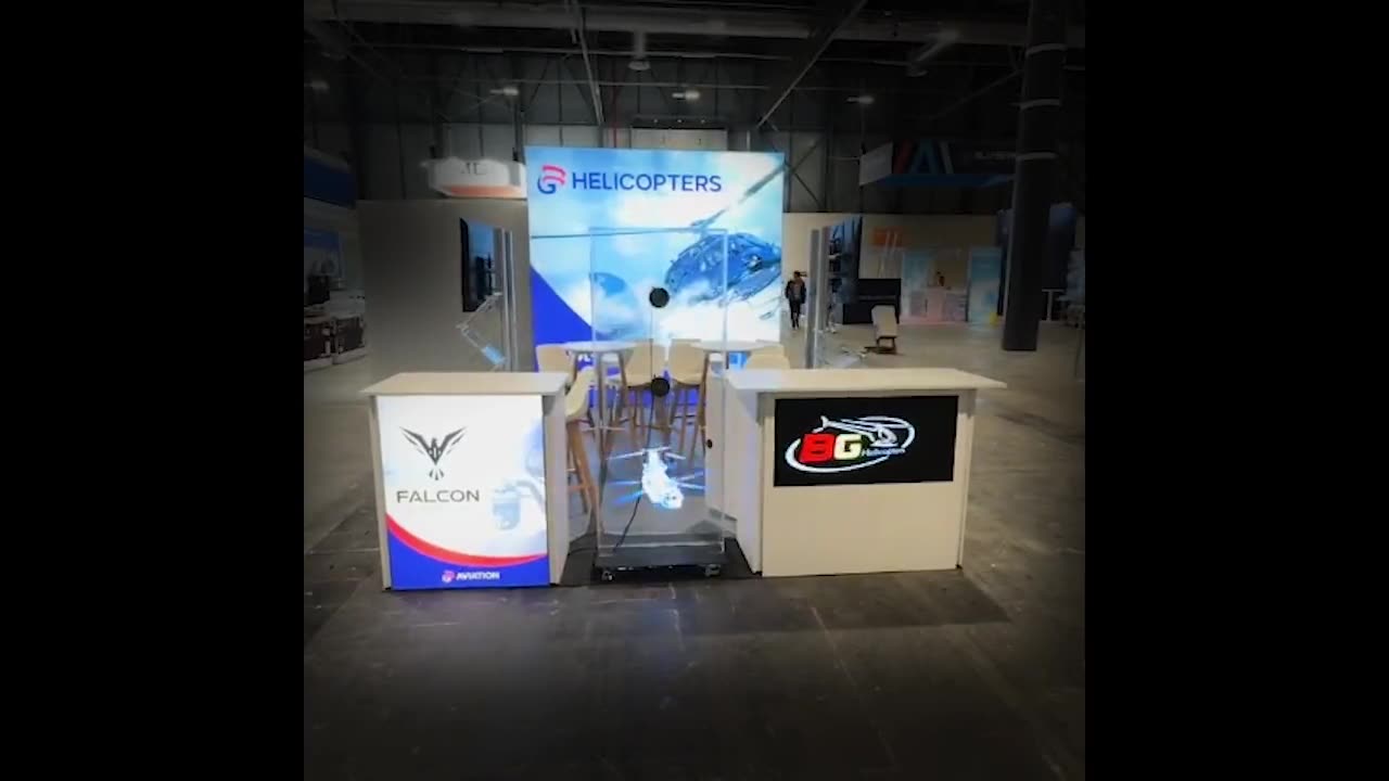 Stand de BG Helicopters con mostrador LED y holograma